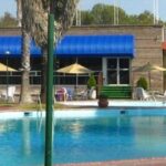 Las Palmas Midway Inn